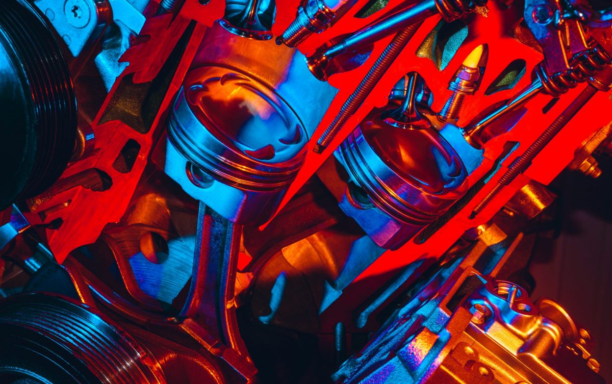Fragment of a modern car engine. Motor piston closeup